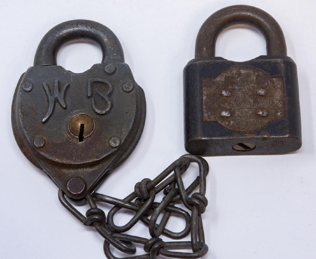 Antique Cast Iron Padlocks by WB & Fraim: Two Antique Cast Iron Padlocks by WB & Fraim. One with chain. Larger measures 3.5 inches in length.