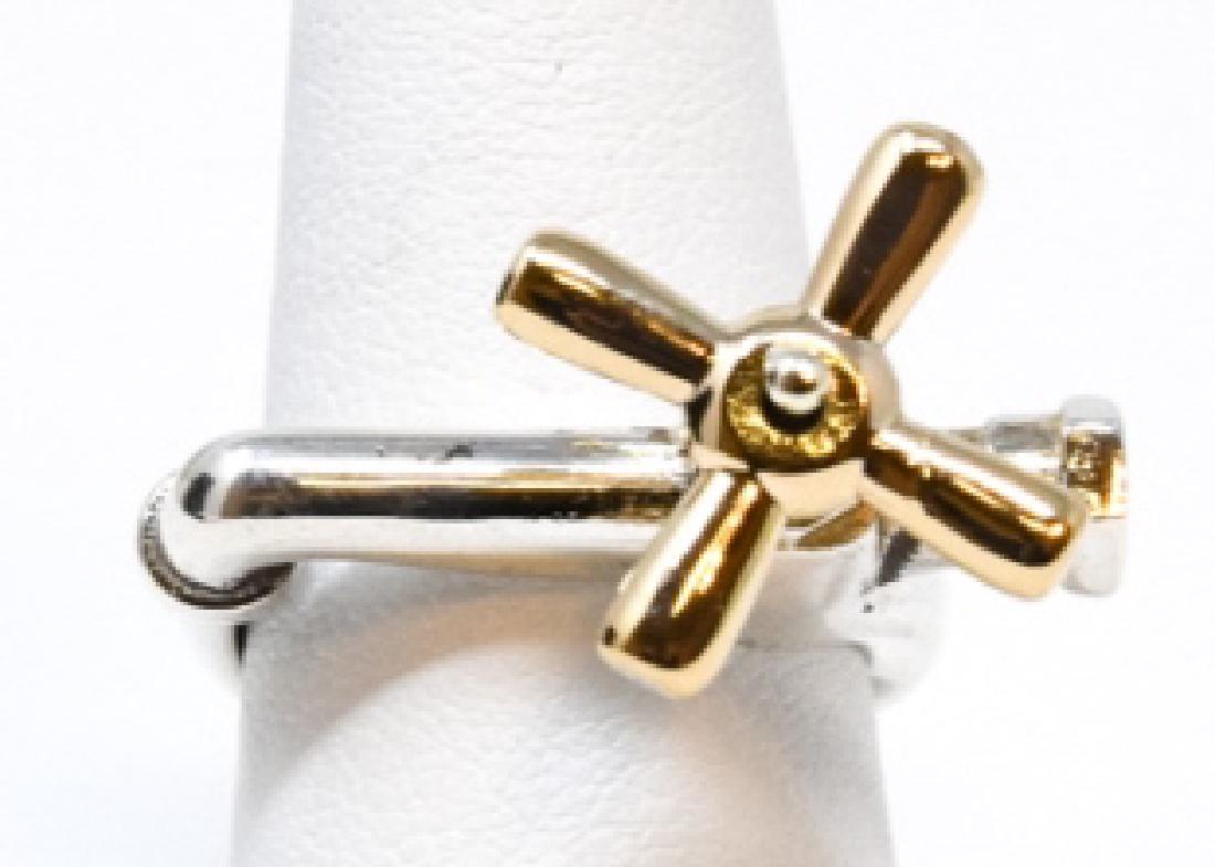 Figural Sterling Silver Sink Faucet Ring: Figural Sterling Silver Sink Faucet Ring. Sterling silver and vermeil. Faucet handle spins. Ring size 8 can be resized.