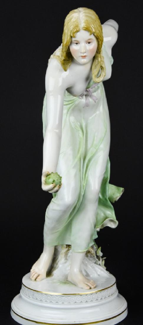 Meissen Walter Schott Female Porcelain Figure: Meissen Walter Schott Female Porcelain Figure. Figural porcelain statue of a classical / Grecian woman with an outstretched arm on a round base. Bears the blue crossed sword mark and incised Q180 and