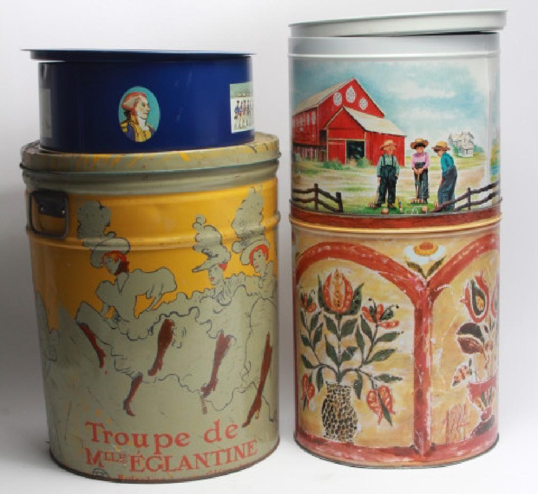 4 Lithographed Lidded Tins: 4 Lithographed Lidded Tins. Each features a unique lithographed design. Largest measures 15.5 inches x 12 inches in diameter.