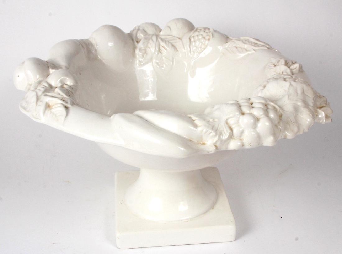 Large Blanc De Chine Pedestal Bowl/ Centerpiece: Large Blanc de Chine Pedestal Bowl/ Centerpiece. In the style of Italian country pottery, the bowl is stamped at the base with Wm. S. likely for William Sonoma. It has pedestal and the bowl has fruit