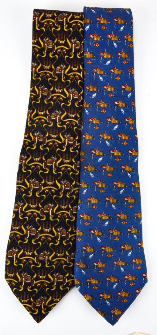 Pair Salvadore Ferragamo SIlk Ties: Pair Salvadore Ferragamo Silk Ties. One tie features a pirate motif and the other a vintage car motif. Ties are 57 inches long.