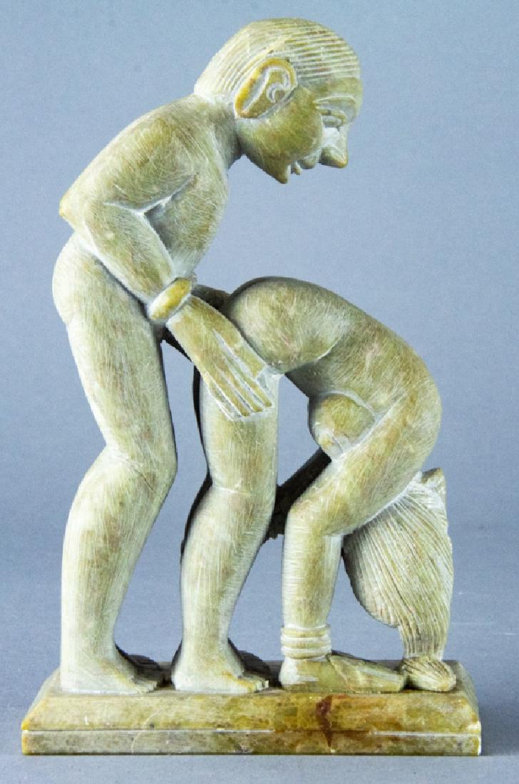 Erotic Asian Soapstone Figural Statue: Erotic Asian Soapstone Figural Statue. Asian soapstone statue with erotic man and woman figural motif. 6.2 5inches x 4 inches x 2 inches.