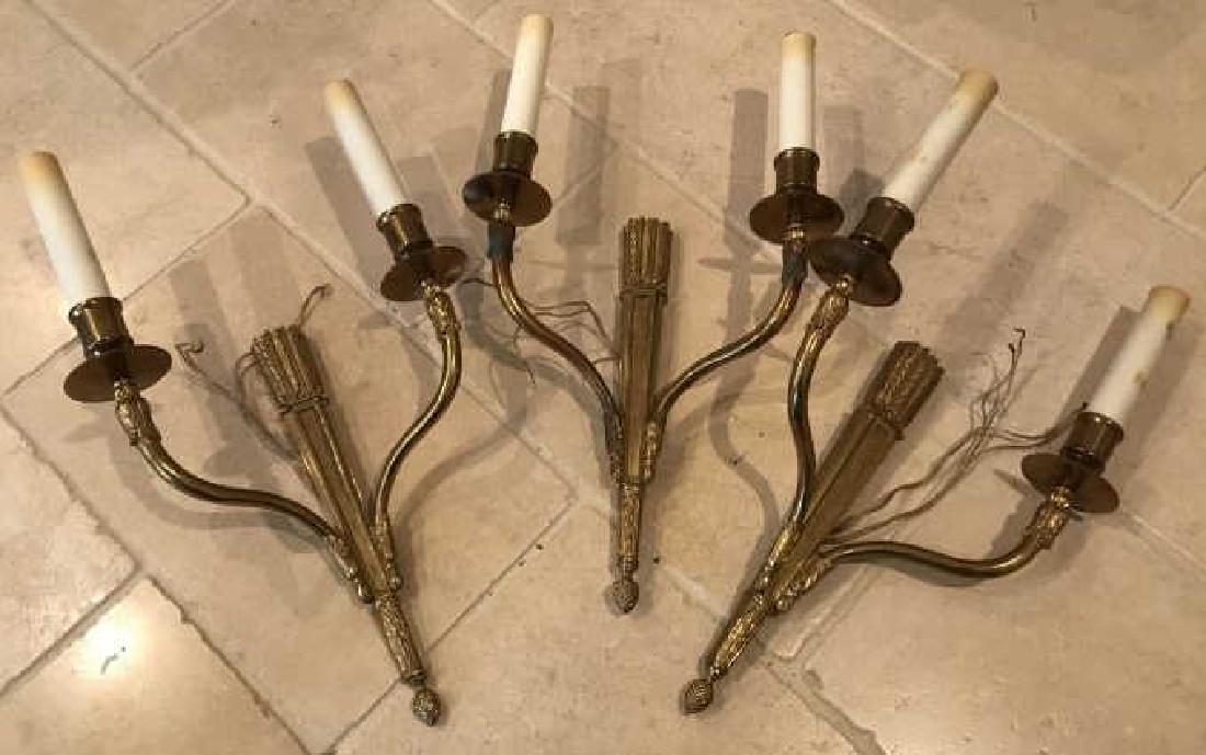 3 French Ormolu Neo Classical French Wall Sconces: Three French Ormolu Neo Classical French Wall Sconces. Arrow and feather motif. Each measures 13.5 x 12 x 5 inches.
