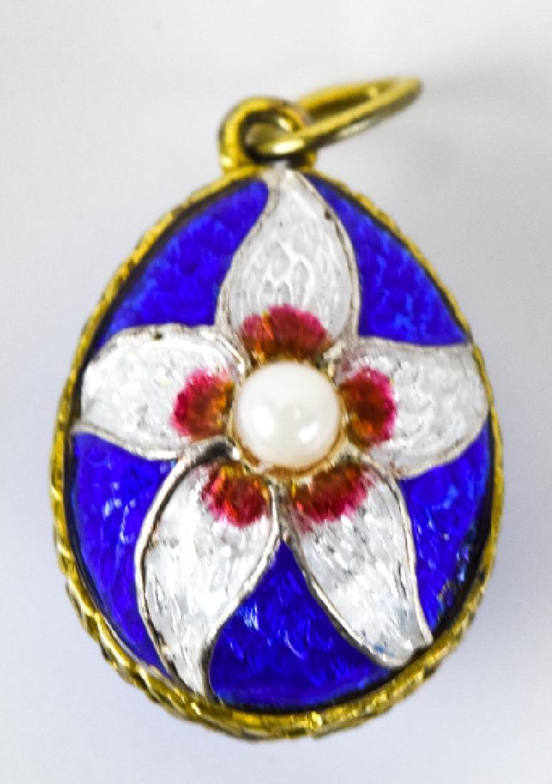 Russian Silver & Enamel Egg Necklace Pendant Charm: Russian Silver & Enamel Egg Necklace Pendant Charm. Blue w floral design. Measures 1 inch w bail.