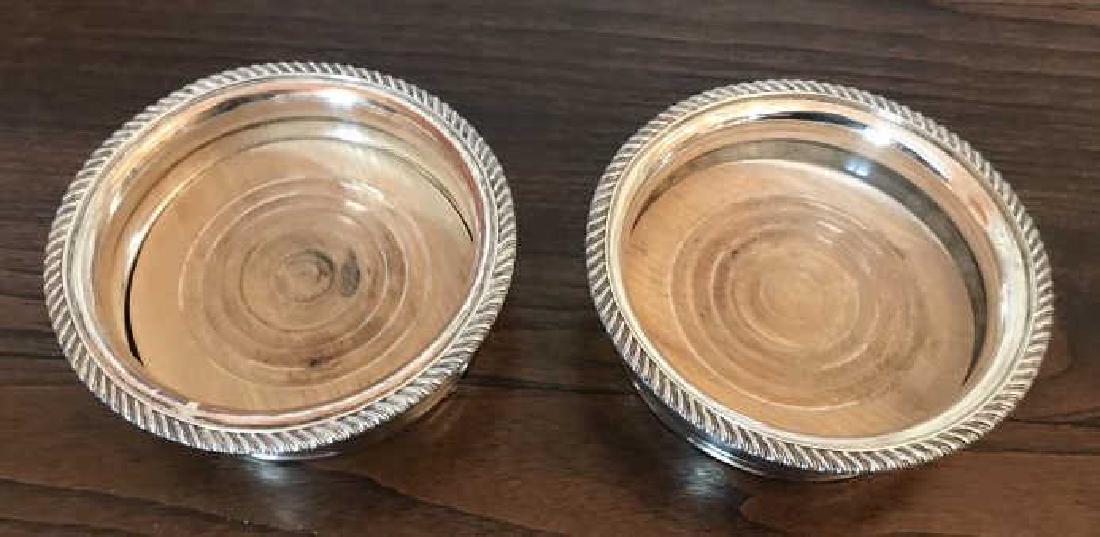 Pair of Vintage Silver Plate Wine Coasters: Pair of Vintage Silver Plate Wine Coasters. Each measures 6.5 inches in diameter. Property of a Greenwich, Connecticut estate.
