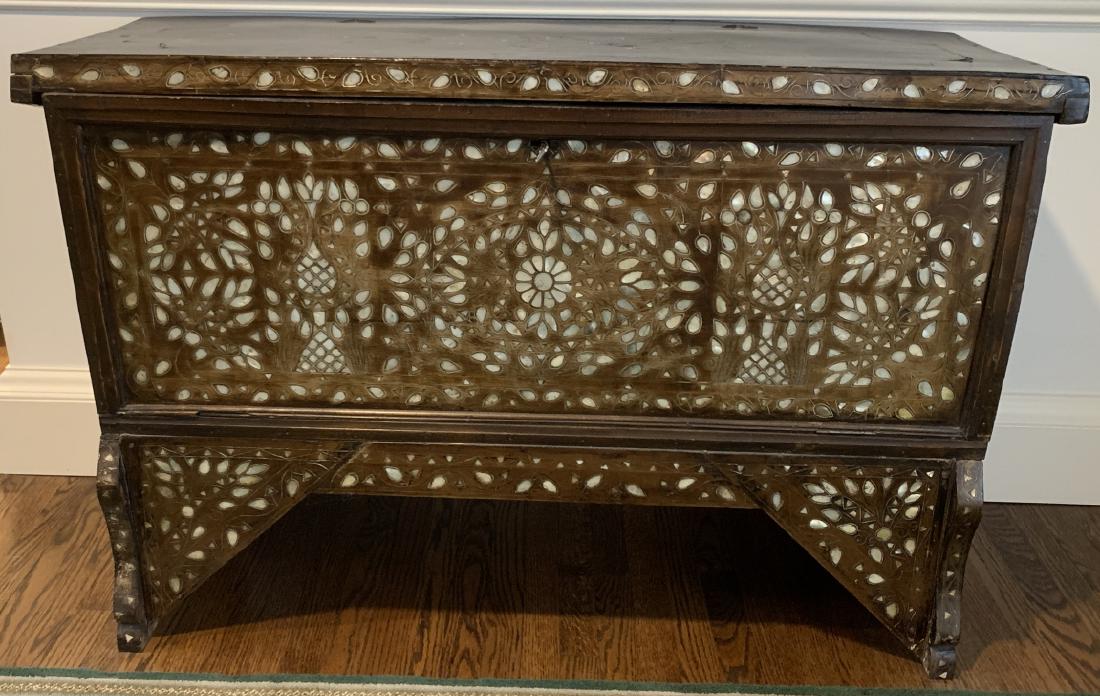 Antique Syrian Chest W Mother of Pearl Inlay: Antique Syrian Chest W Mother of Pearl Inlay. Antique wooden chest with mother of pearl inlay from Demascus Syria. 33.5 inches x 49.5 inches x 18.5 inches. Property of a Greenwich, Connecticut estate.