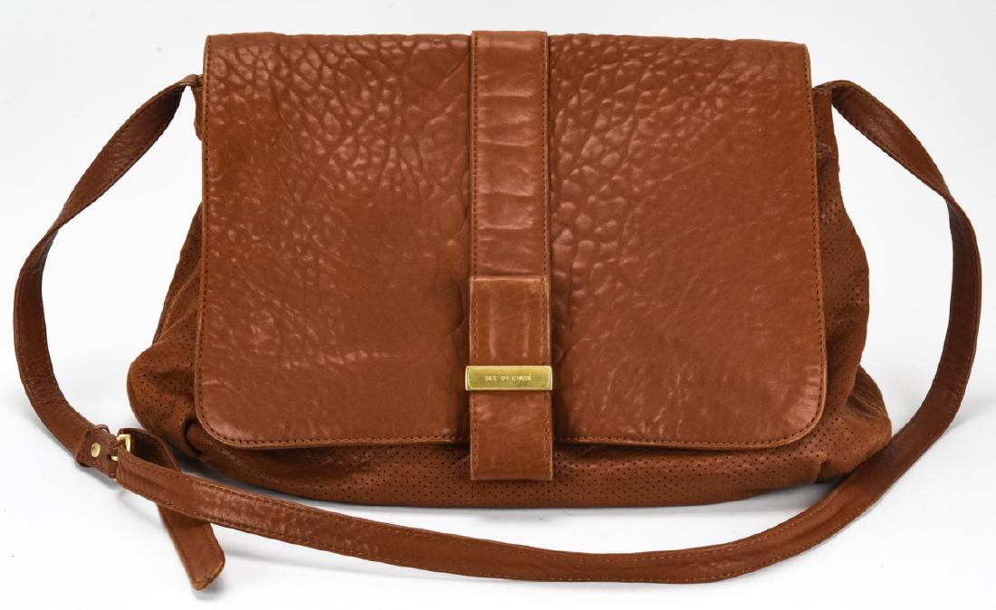 See by Chloe Leather Handbag / Purse: See by Chloe Leather Handbag / Purse. Brown leather handbag labeled See by Chloe. Measures approximately 12 inches x 14 inches x 4 inches. Property of an Irvington, New York estate.
