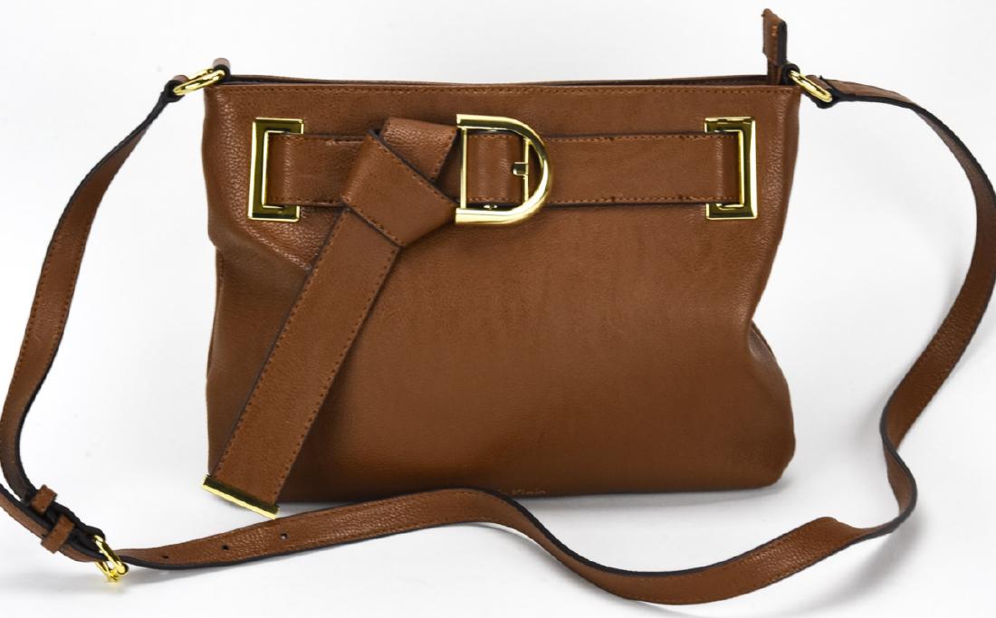 Calvin Klein Crossbody Handbag / Purse: Calvin Klein Crossbody Handbag / Purse, With gold toned hardware by Calvin Klein. Measures approximately 9.5 inches x 12.5 inches without strap. Property of an Irvington, New York estate.
