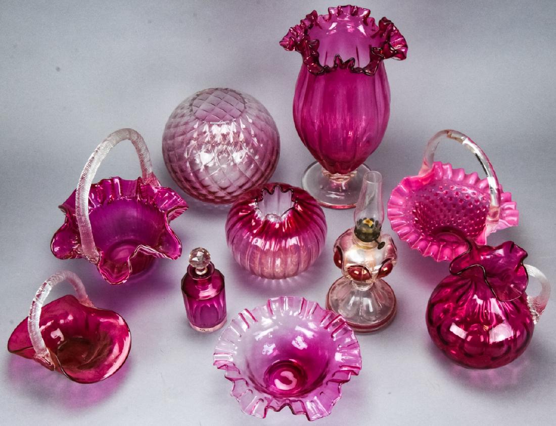 Lot Fenton Style Cranberry & Clear Glass Objects: Lot Fenton Style Cranberry & Clear Glass Objects. Includes fluted, ribbon and hobnail styles of glass centerpieces and decorative objects. Larger vase measures 11 inches x 7 inches in diameter. Proper