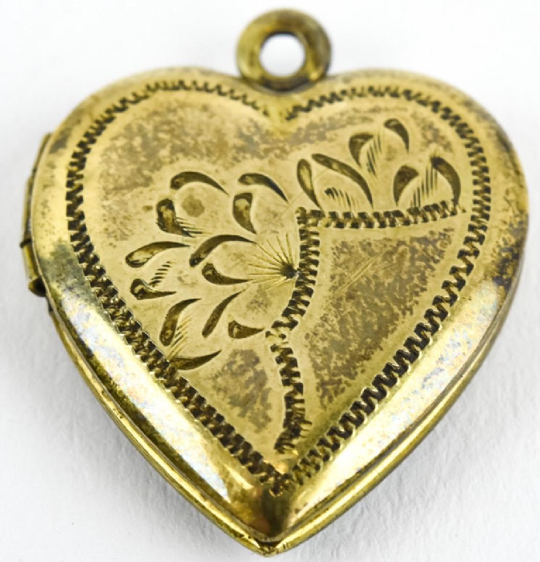 Vintage Vermeil Silver Heart Form Locket Pendant: Vintage Vermeil Silver Heart Form Locket Pendant. Gold filled / plated on sterling silver. Measures 1 inch in length.