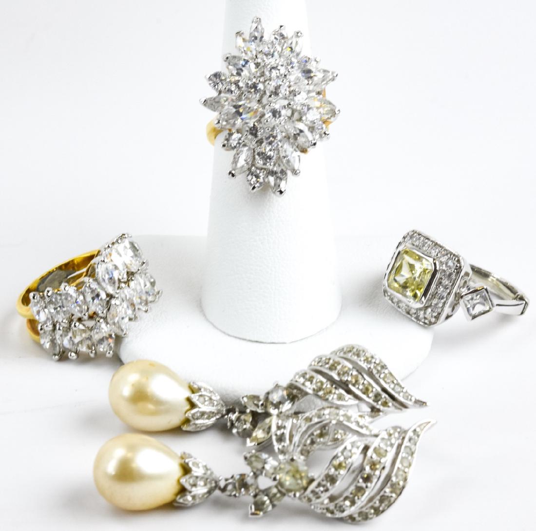 Lot Costume Cocktail Rings & Pair Pearl Earrings: Lot Costume Cocktail Rings & Pair Pearl Earrings. Lot of 3 super sparkly paste cocktail rings with a pair of paste and pearl “Panetta” earrings. One needs repair. Rings each measure approximately