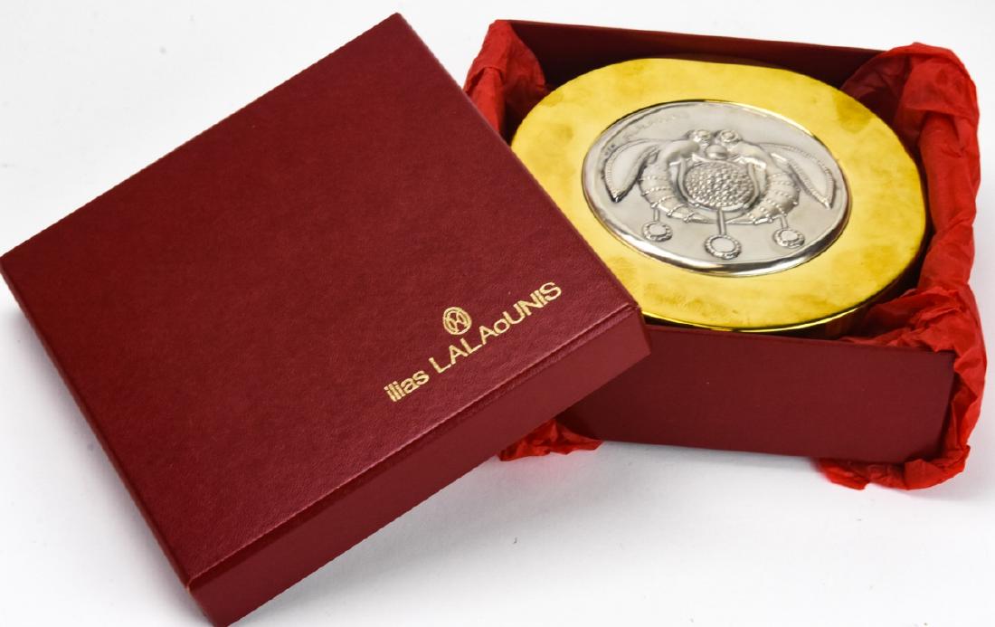 Vintage Ilias Lalaounis Sterling Silver Round Box: Vintage Ilias Lalaounis Sterling Silver Round Box. Solid sterling silver w a gold wash in original box. Measures 5.5 inches in diameter.