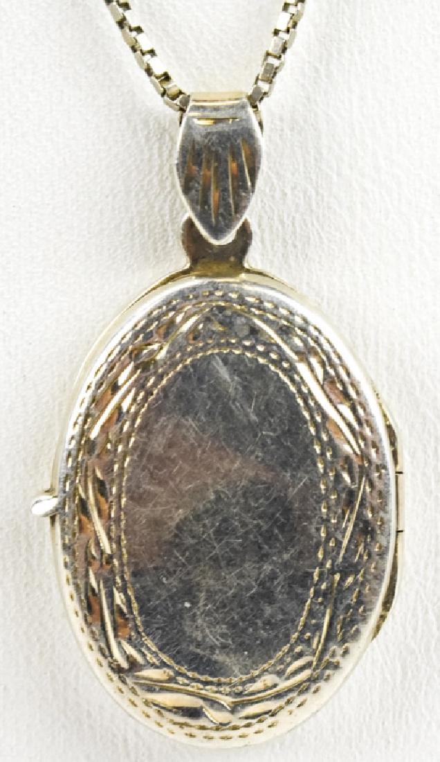 Chased Sterling Silver Locket Pendant on Chain: Vintage Chased Sterling Silver Locket Pendant on Chain. Chain and locket are both sterling. Chain measures 20 inches in length.