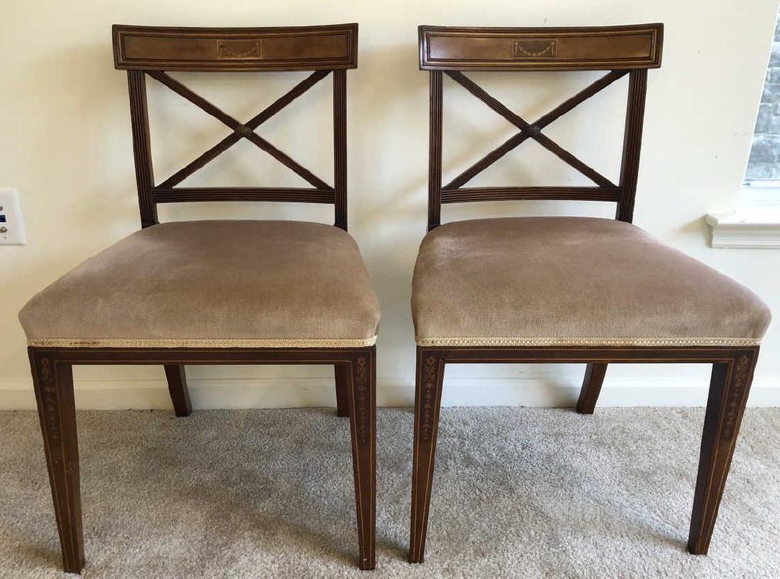 Pair English Edwardian Marquetry Side Chairs: Pair English Edwardian Marquetry Side Chairs. Marquetry swag motif detail on crossed back banded chairs with velvet upholstery. 33 inches x 20 inches 19 inches