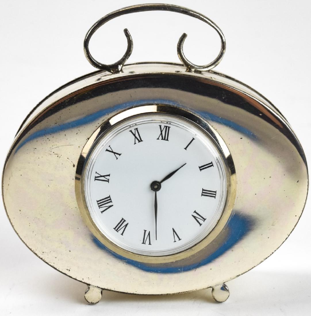 Vintage Emilio Roselli Sterling Silver Desk Clock: Vintage Emilio Roselli Sterling Silver Oval Desk Clock. Small case clock with scroll handle and inlaid clock face. 3 inches x 3 inches
