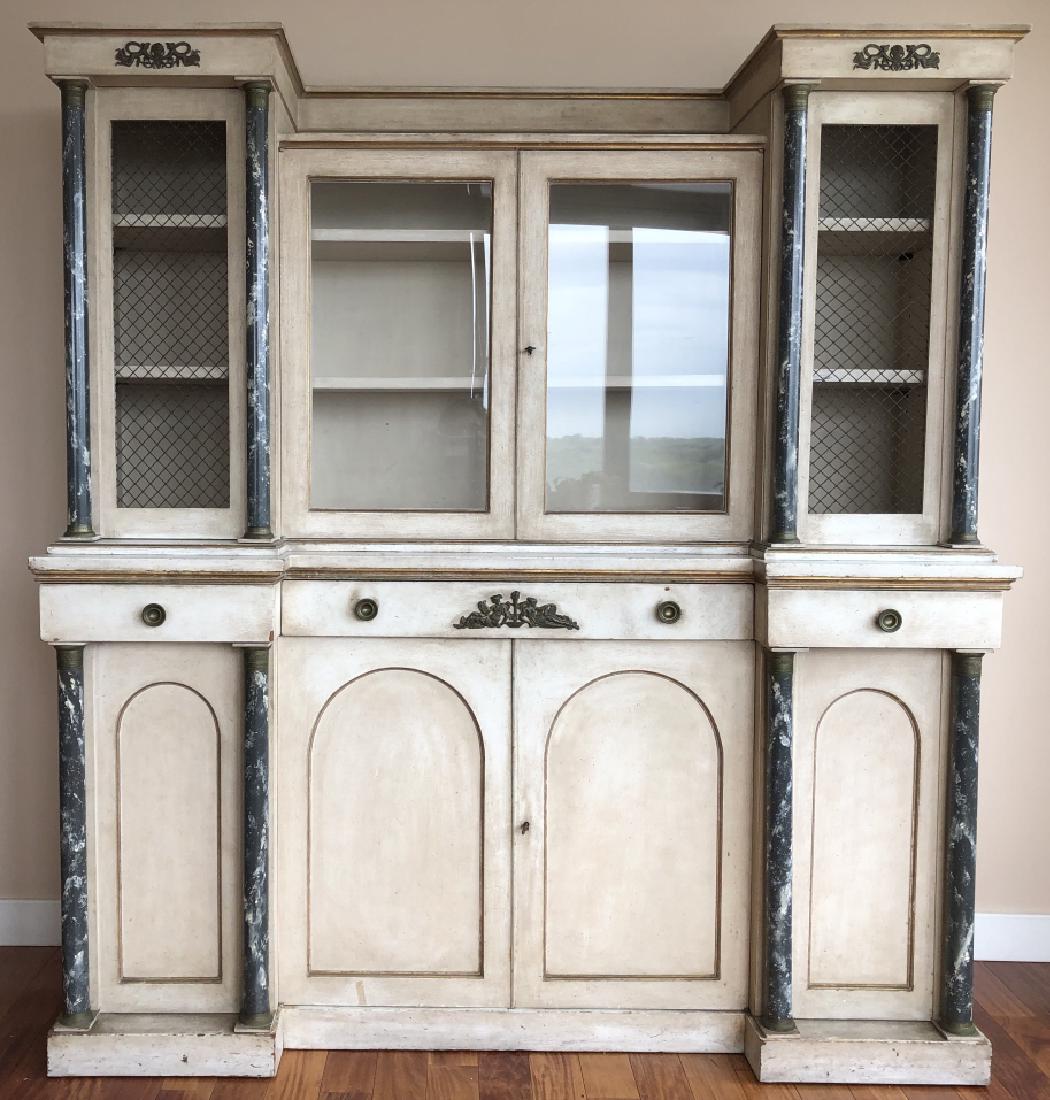 French Neo Classical White Washed Buffet: French Neo Classical White Washed Buffet. Buffet has glass door, wire front doors and lower cabinets. Faux marble columns act as handles on cabinets. There are ormolu mounts with neo classical themes.