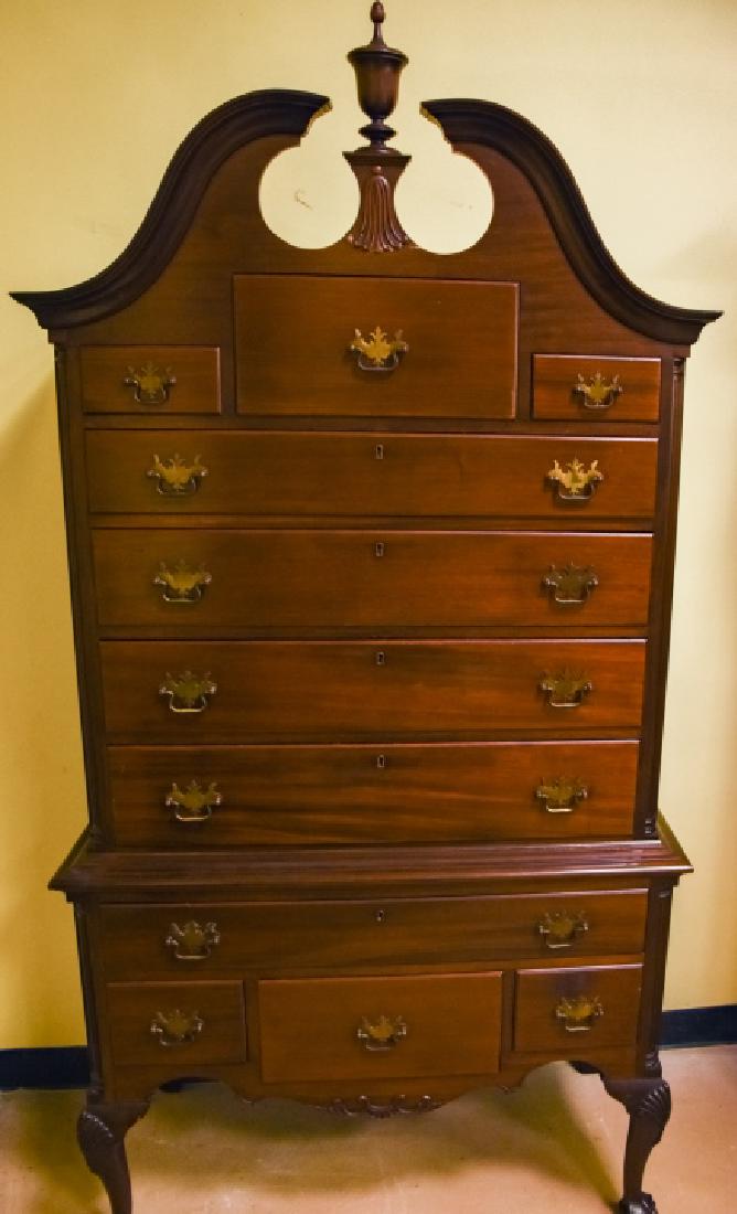 Mahogany Chippendale Style Ball & Claw Highboy: Mahogany Chippendale Style Ball & Claw Highboy. Ball and Claw footed with urn form center spindle a top full bonnet. Bonnet has been repaired. 2 pieces. 81 inches inches x 42 inches x 20 inches x 24 i