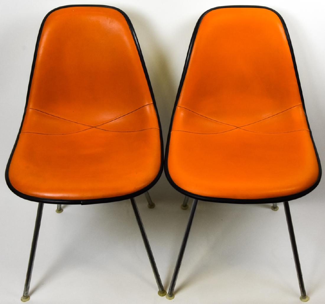 2 Vintage Herman Miller Eames DSX Side Chairs: 2 Vintage Herman Miller Eames DSX Side Chairs. Each features a orange naugahyde seat, marked for Herman Miller underneath the chair. 31 inches x 19 inches x 15 inches.