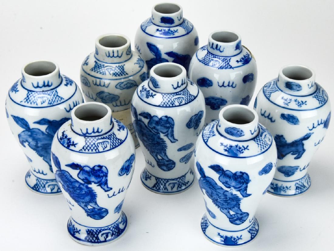 8 Chinese Blue & White Porcelain Garniture Vases: 8 Chinese Blue & White Porcelain Garniture Vases. This lot includes eight small blue and white Chinese porcelain ginger jar form garniture vases. Each measures approximately 5.5 inches x 3 inches in d