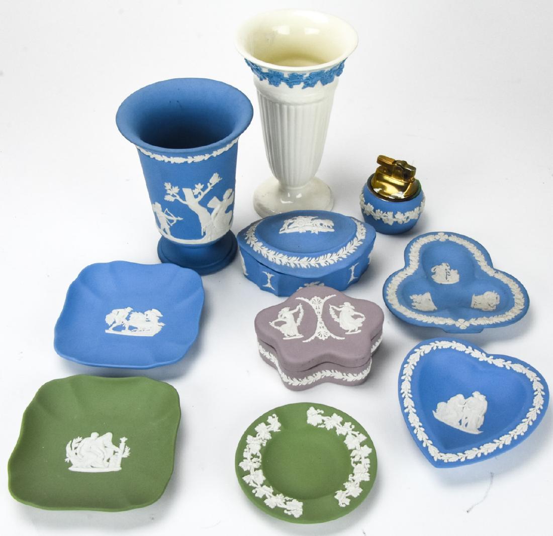Lot Wedgwood England Jasperware Decorative Objects: Lot Wedgwood England Jasperware Decorative Objects. This lot includes porcelain jasper ware decorative objects by Wedgwood. Includes ash trays, a lighter, trinket box, and vases. Each piece is marked 