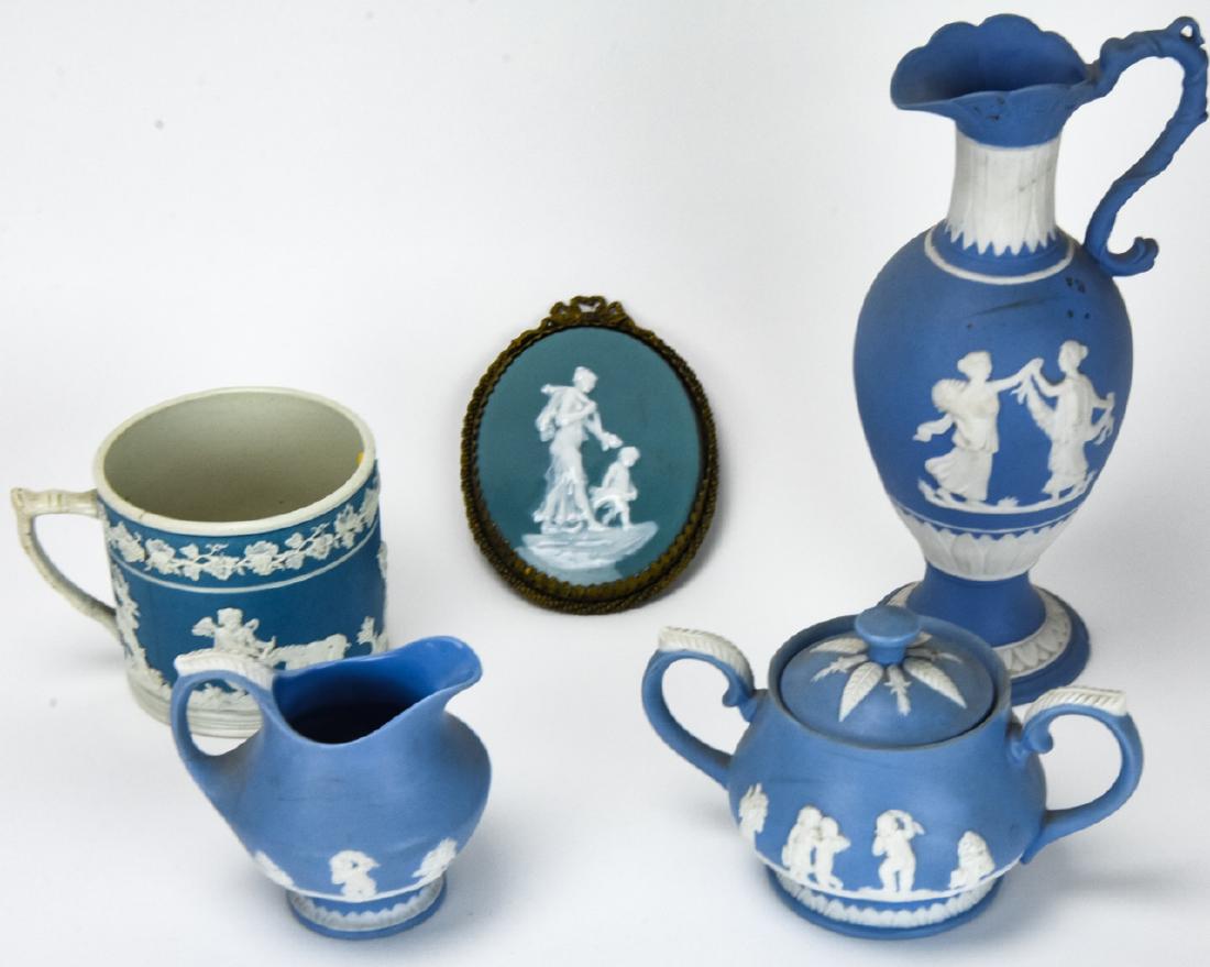 Lot of Wedgwood Style Porcelain Decorative Objects: Lot of Wedgwood Style Porcelain Decorative Objects. This lot featured unmarked Wedgwood style jasper ware decorative objects, including a small scale ewer and a plaque. Ewer measures 8 inches x 3.5 in