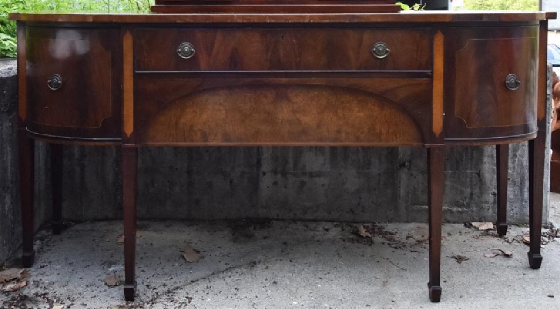 English Federal Style Mahogany Sideboard: English Federal Style Mahogany Sideboard. English sideboard featuring burled veneer details and two pull out drawers flanked by two cabinets. Bras hardware, tapered legs. Measures 36.5 inches x 75 inc