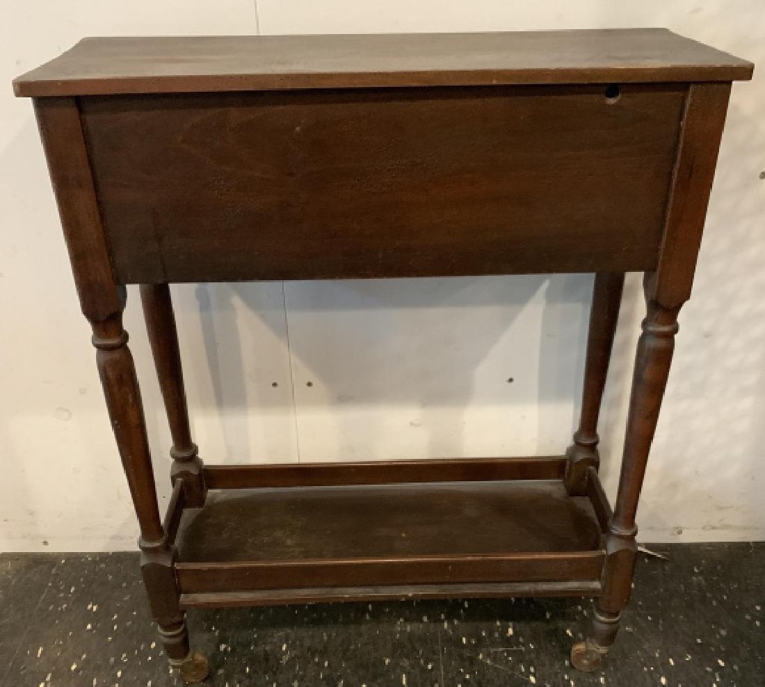 Antique Lift-Top Cabinet With Spindle Legs: Antique Lift-Top Cabinet With Spindle Legs. With lower shelf. 31 inches x 25 inches x 9.5 inches.