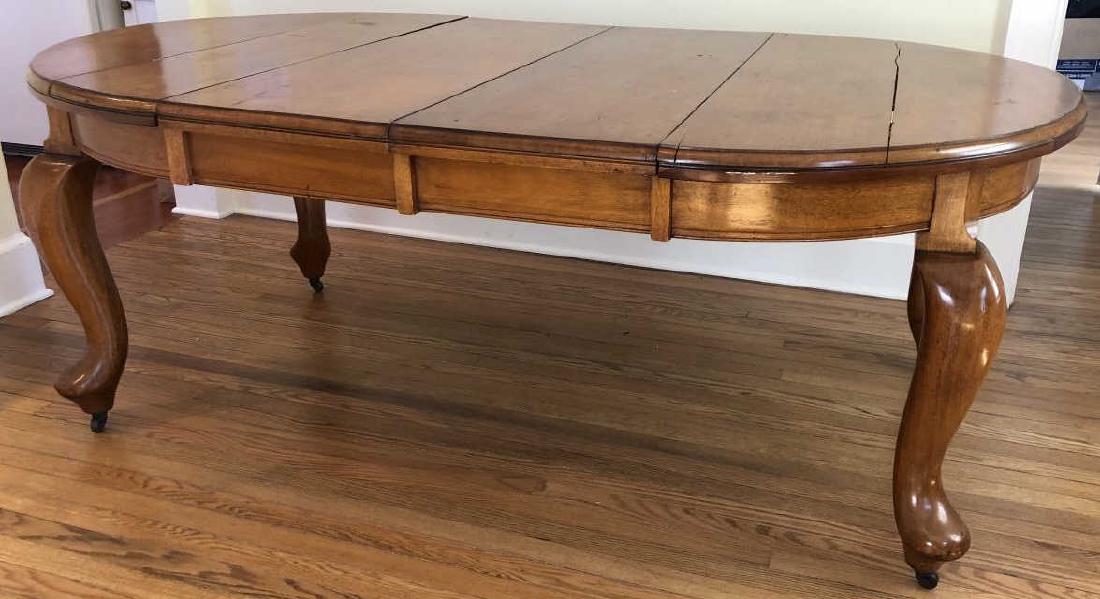 Australian Federation Queensland Maple Table: Australian Federation Period Queensland Maple Dining Table. Table has 3 leaves that measure 16 inches each across. Made and purchased in Australia early 20th Century. Table is 48 inches by 47 inches w