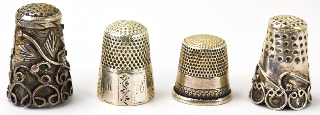 Four Antique Sterling & Silver Sewing Thimbles: Four Antique Sterling & Silver Sewing Thimbles. Largest measures just over 1 inch.