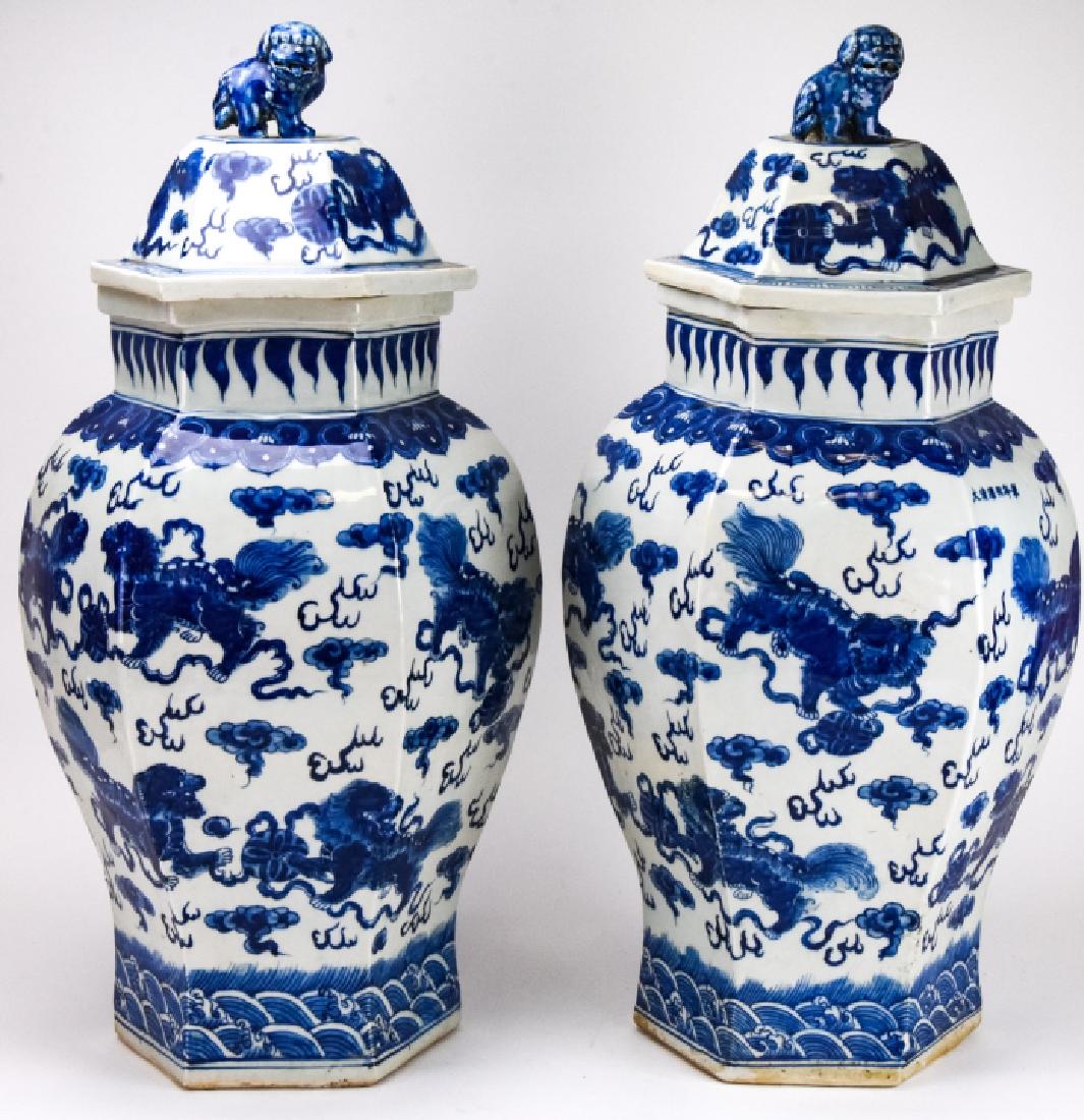 Pair Large Chinese Blue & White Ginger Jars: Pair Large Chinese Blue & White Ginger Jars. This lot features a pair of large Chinese blue and white porcelain ginger jars. The lids feature a figural foo dog handle. 26 inches x 12 inches in diamete