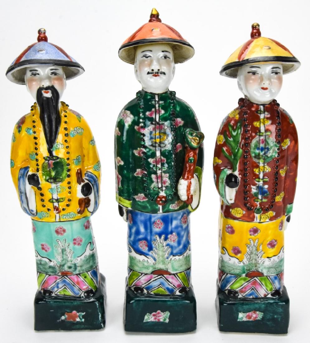 3 Chinese Porcelain Figural Statues of Wise Men: 3 Chinese Porcelain Figural Statues of Wise Men / Sages. This lot includes three porcelain figural statues of wise men with hand painted details. All are marked on the bottom. 10.5 inches x 2.5 inches