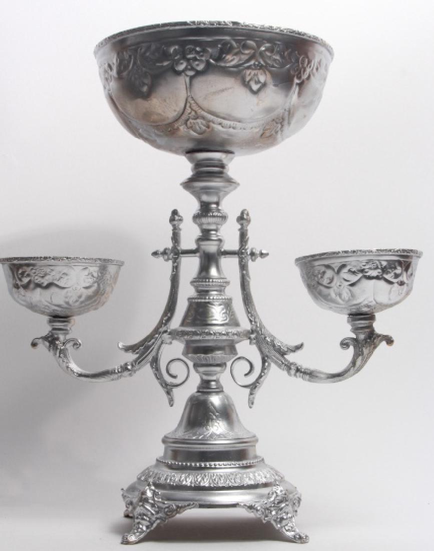 Large Silver Tone Epergne Form Center Piece: Large Silver Tone Epergne Form Center Piece. Measures 16.5 x 14 x 8 inches.