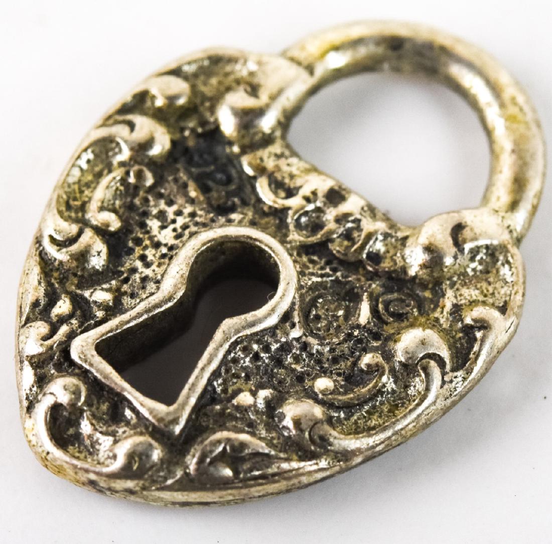 Vintage Sterling Heart Shaped Padlock Pendant: Vintage Sterling Heart Shaped Padlock Pendant. Measures 1 inch in length.