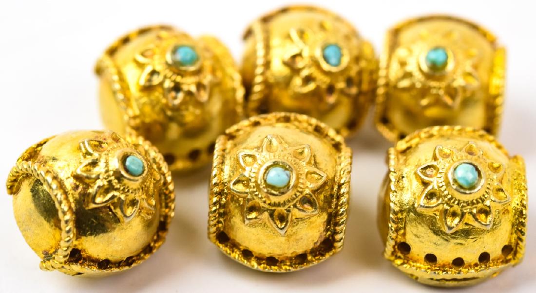 Set of Antique Gilt Metal & Turquoise Buttons: Set of Antique Gilt Metal & Turquoise Buttons. Gold plated Mughal style. Each approximately 3/8ths of an inch in width.
