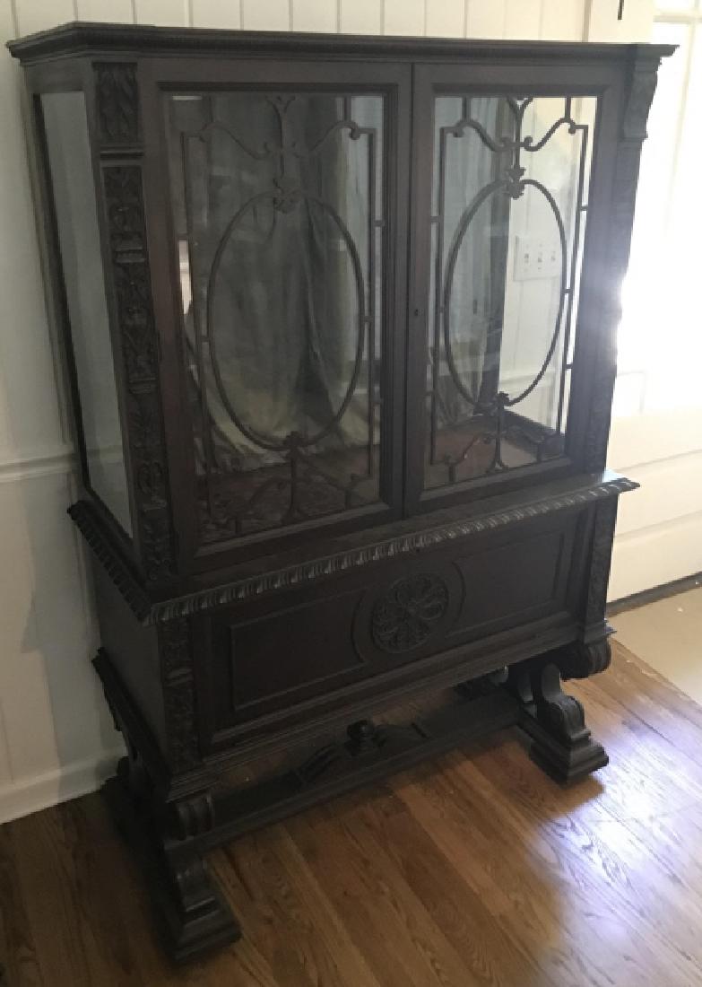 Antique C 1900 Renaissance Revival Curio Cabinet: Antique C 1900 Renaissance Revival Curio Cabinet. Mahogany tone, interior with two shelves. Drop front under the display area. Does not come with key. Measures 66.5 x 44.5 x 20 inches. From a Pound Ri