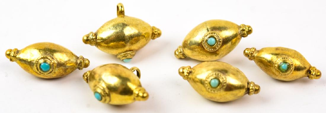 Set of Antique Gilt Metal & Turquoise Buttons: Set of Antique Gilt Metal & Turquoise Buttons. Gold plated Mughal style. Each measures .75 of an inch in length.