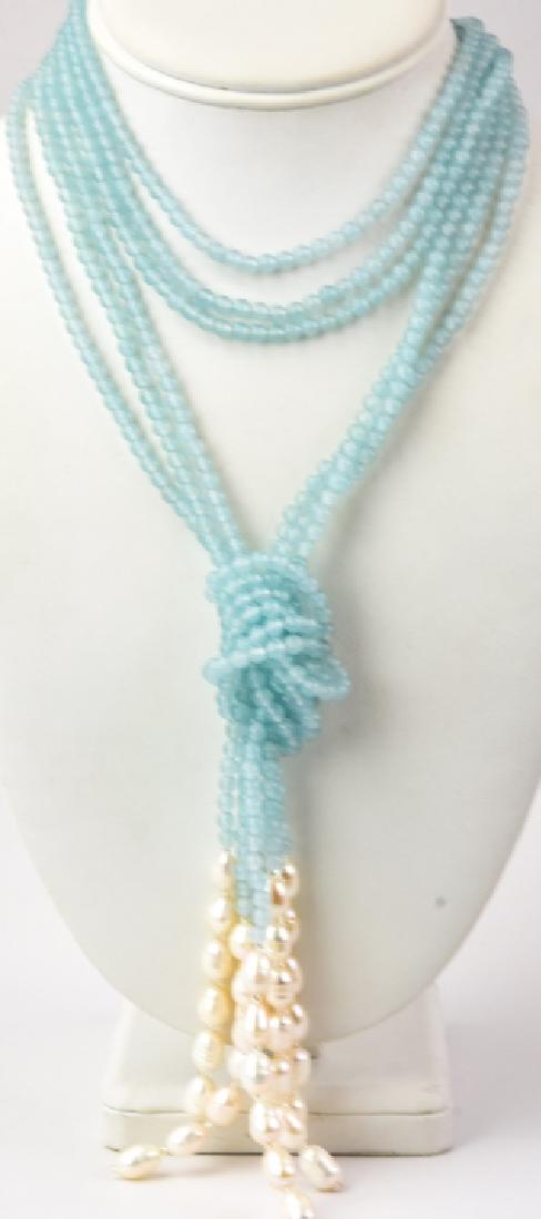 Triple Strand Aqua & Baroque Pearl Necklace: Triple Strand Aqua & Baroque Pearl Necklace. Can be worn as a necklace with tassel knot or lariat. Measures 30 inches plus 6 inch tassel as shown.