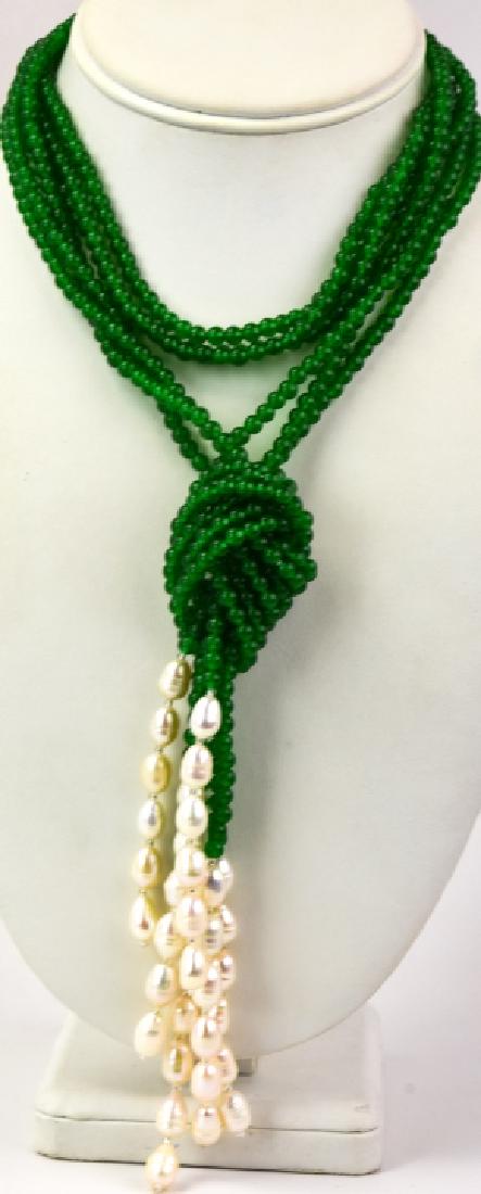 Triple Strand Green Jade & Baroque Pearl Necklace: Triple Strand Green Jade & Baroque Pearl Necklace. Measures 30 inches plus 5.5 inch tassel.