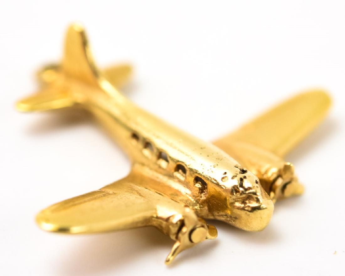 Estate 14kt Yellow Gold Plane Charm: Estate 14kt Yellow Gold Plane Charm. Measures .75 of an inch in length.