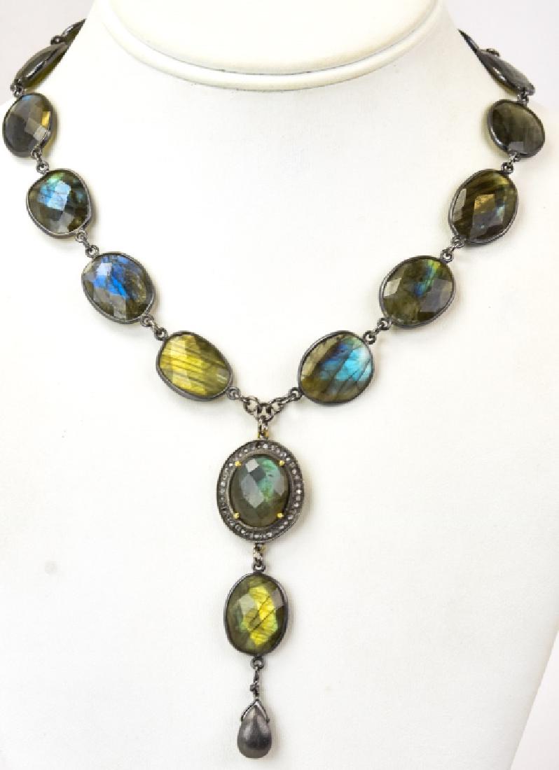 Labradorite Statement Necklace: Labradorite Statement Necklace. Labradorite and pewter toned metal statement necklace with hanging drop. 15 inches plus pendant drop.