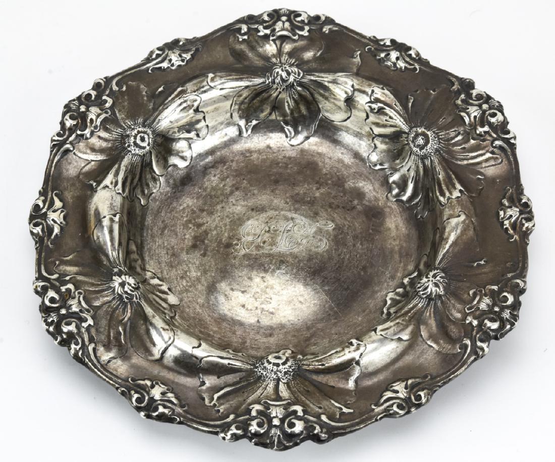 Antique Gorham Sterling Silver Wine Bottle Coaster: Antique Gorham Sterling Silver Wine Bottle Coaster. Hallmarked on back. Floral motif. Measures 7 inches in diameter. Weighs approximately 6.8 standard ounces.