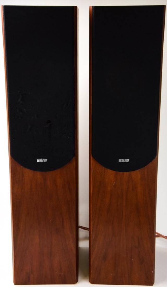 2 Bowers & Wilkins Standing Speakers: 2 Bowers & Wilkins Standing Speakers. Serial number 007144. 32 inches x 8 inches x 10 inches.