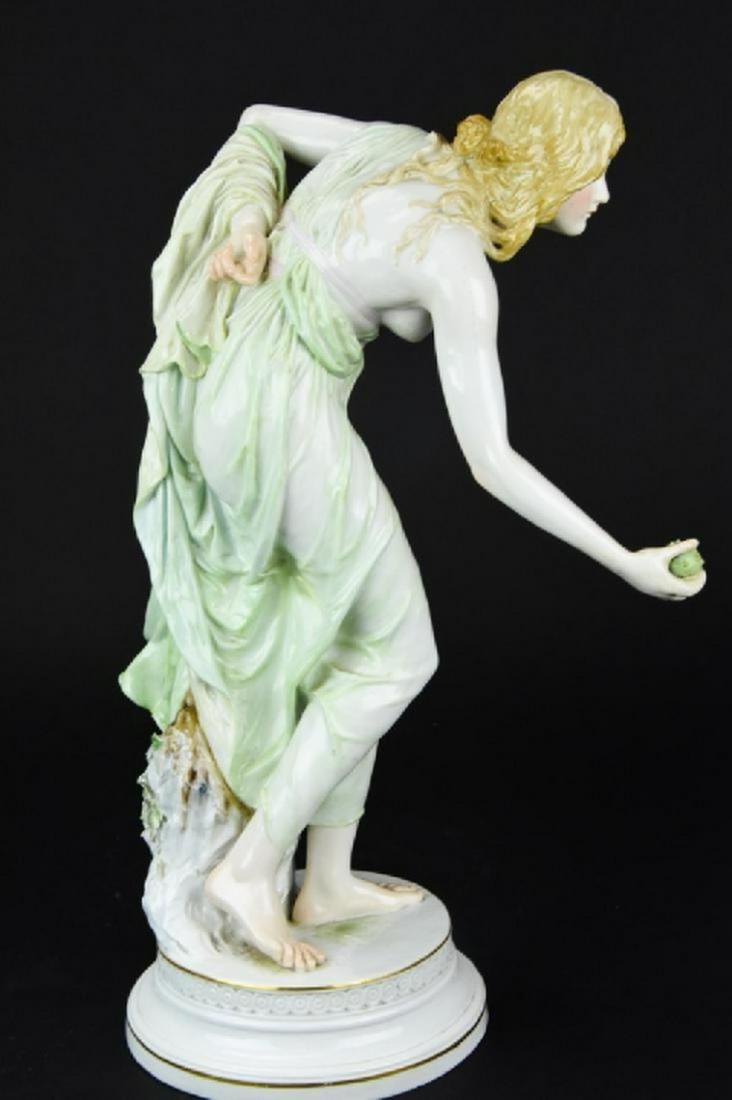 Meissen Walter Schott Female Porcelain Figure: Meissen Walter Schott Female Porcelain Figure. Figural porcelain statue of a classical / Grecian woman with an outstretched arm on a round base. Bears the blue crossed sword mark and incised Q180 and
