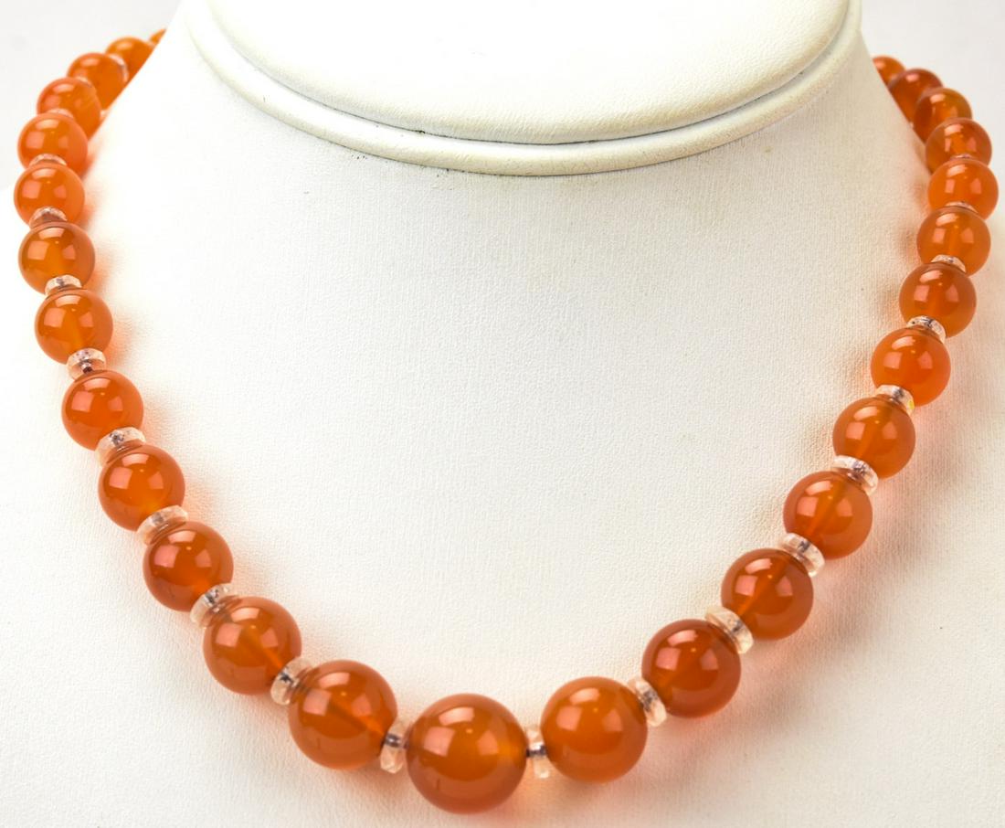 Antique Carnelian & Crystal Bead Necklace: Antique Carnelian & Crystal Bead Necklace. Graduated size beads. Measures 15.5 inches in length.