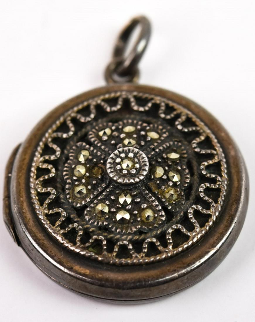 Vintage Sterling & Marcasite Locket Pendant: Vintage Sterling & Marcasite Locket Pendant. Hallmarked 925 PAS. Measures 1.25 inches in length.