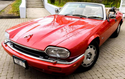 Jaguar 1996 XJS Red Convertible Coupe: Jaguar 1996 XJS Red Convertible Coupe. Having approximately 23,000 miles. This vehicle is a 6 cylinder, XJS 2 + 2 model, with automatic transmission, leather interior, 4.0 litre engine. It has been ga