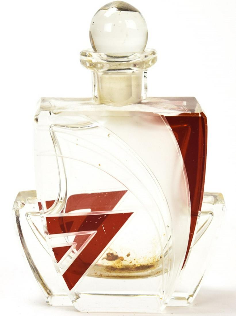 Antique Art Deco Art Glass Perfume Bottle: Antique Art Deco Art Glass Perfume Bottle. Red, clear and frosted. Measures 4.25 inches in height.