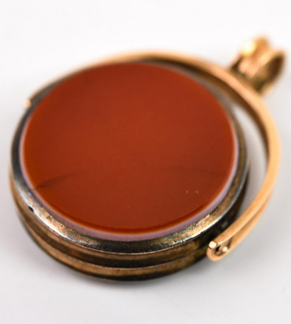 Antique 14kt Gold Sardonyx & Carnelian Spinner Fob: Antique 14kt Gold Sardonyx & Carnelian Spinner Fob or Necklace Pendant. Antique 19th century pendant with sardonyx on one side, carnelian on the other side, acid tests at 14kt. Measures just over 1 in