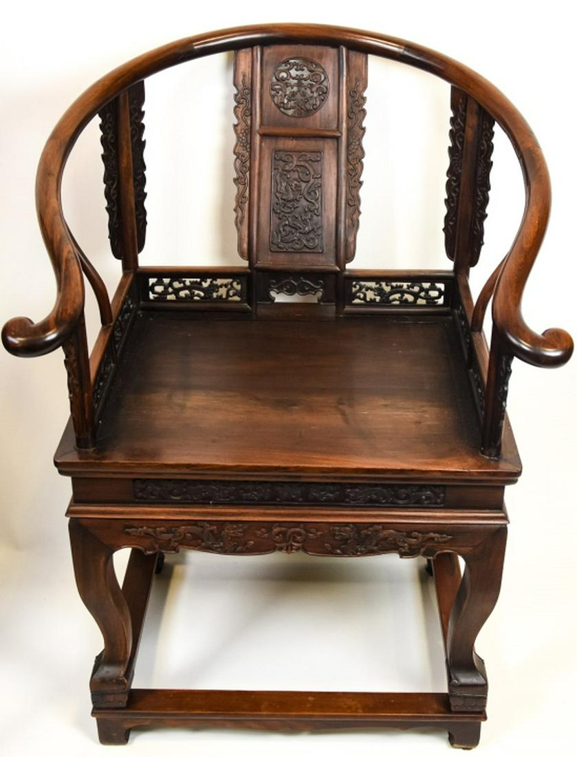 Antique Chinese Huanghuali Type Throne Chair: Antique Chinese Huanghuali Type Throne Chair. This lot features an antique Chinese hand carved rosewood Huanghuali type throne or emperor / empress arm chair. 42 inches x 29 inches x 26 inches.